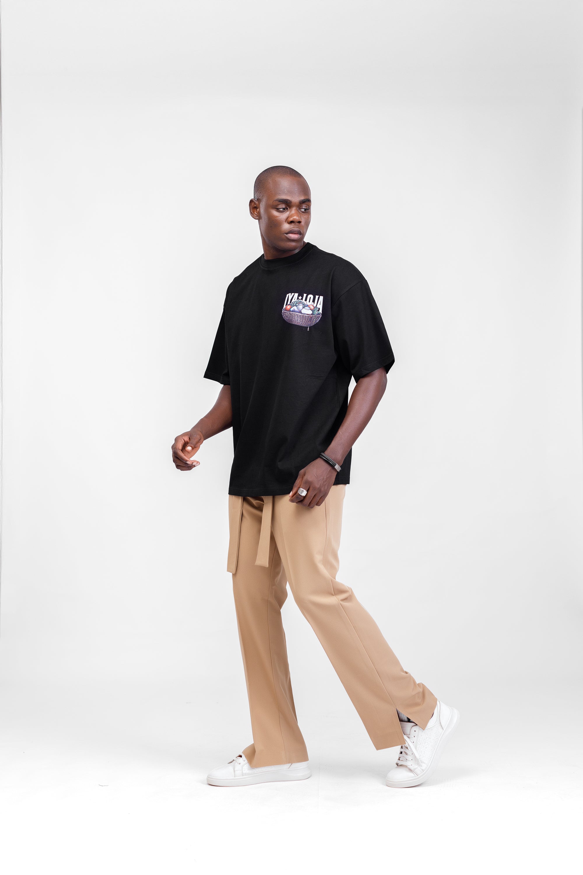 Iyaloja Tee (Pocket Logo) in Black
